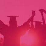 Graduates holding hands