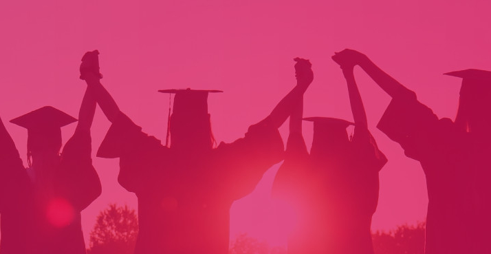 Graduates holding hands